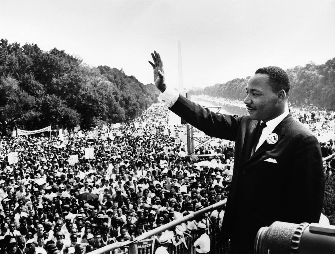 Dr. Martin Luther King Jr. addresses the crowd from the steps of the Lincoln Memorial during the 1963 March on Washington.